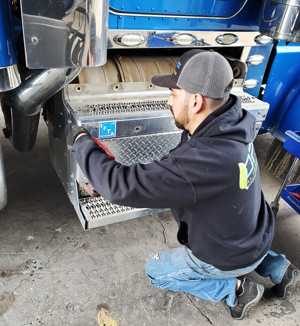 A DPF Alternatives dpf mechanic in South Dakota servicing a car.